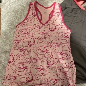 Selling a pink tang top that is supper cute. The design is beautiful